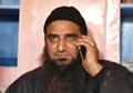 Separatist leader Masarat Alam waves Pakistan flag in Srinagar